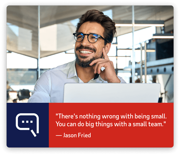 Smiling man with glasses using a laptop. Accompanying quote: 'There's nothing wrong with being small. You can do big things with a small team.' — Jason Fried.