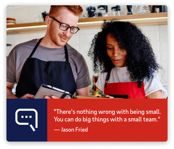 Male and female employee standing in coffee shop. They both have work aprons on. Quote at bottom of image states, There's nothing wrong with being small. You can do big things with a small team. Author Jason Fried